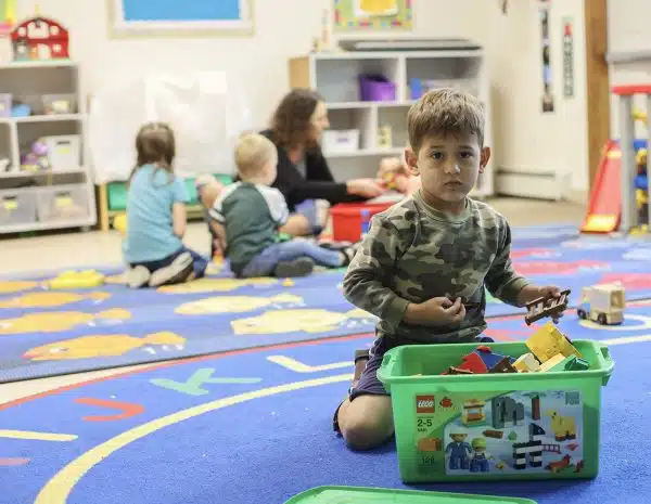 Boy playing with legos